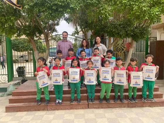 A class group with Reading Champion bags